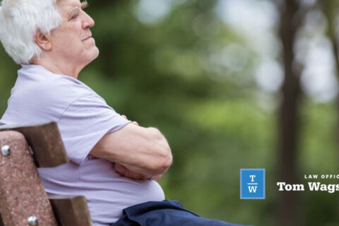 Old man seating on the bench