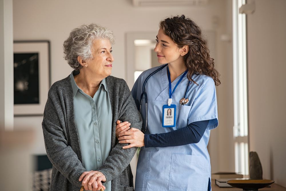 Doctor is taking care of old women