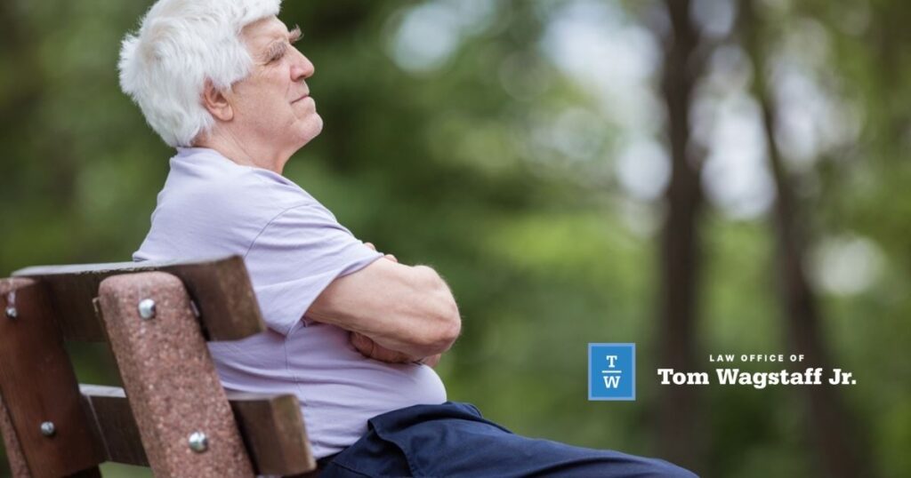 Old man seating on the bench